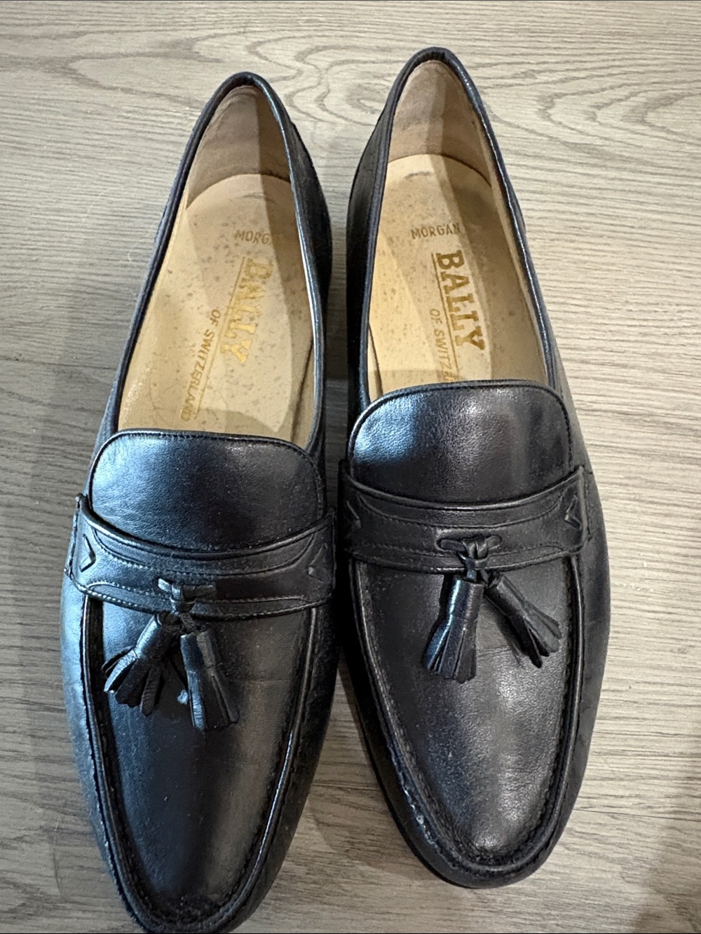 Bally Black Leather Tassel Penny Loafers